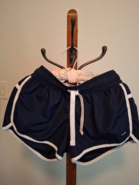 Champion C9 Running Navy Athletic Shorts with White Dolphin Trim. NWOT. Ladies M